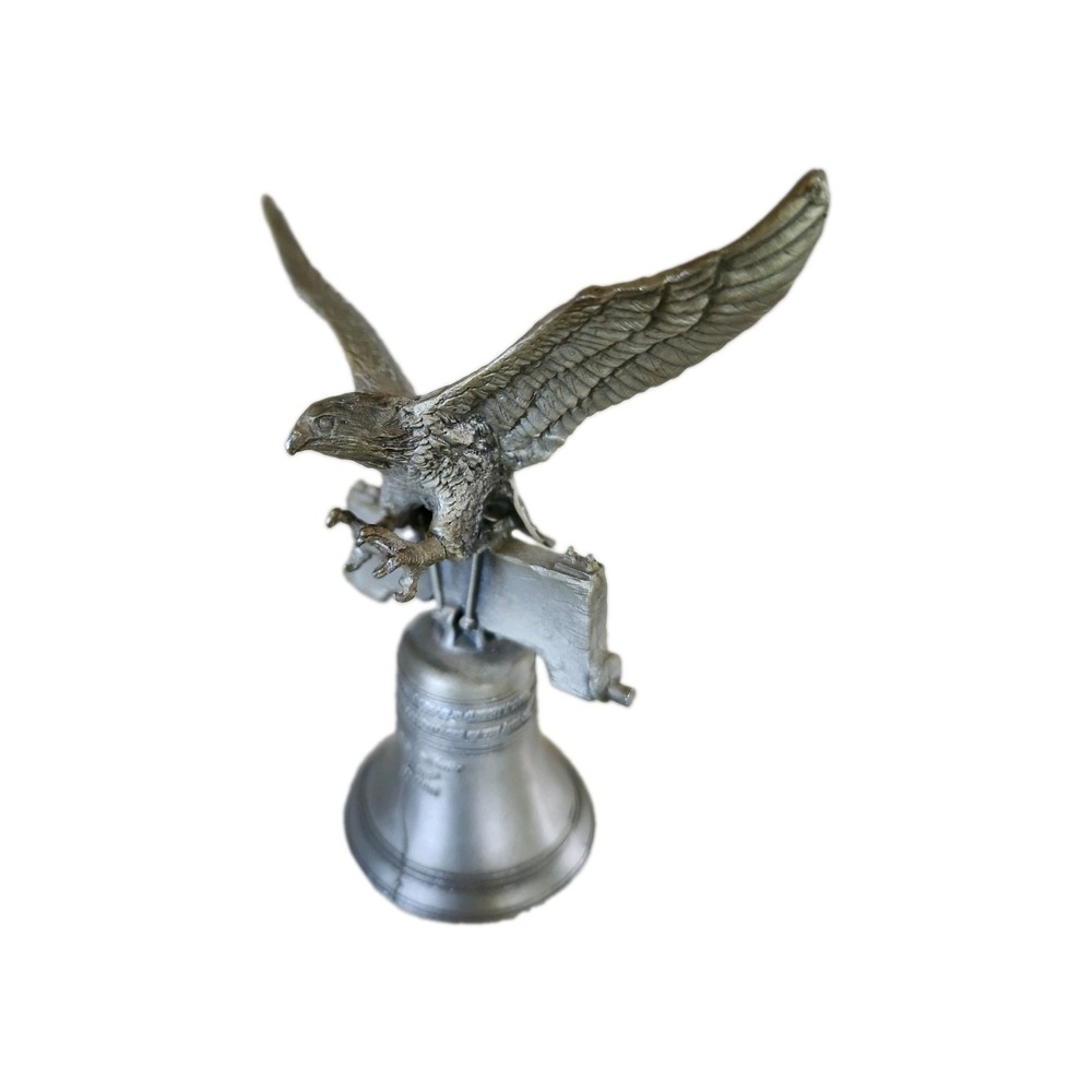 Vintage Hudson Pewter Liberty Bell figurine featuring a spread-wing bald eagle
